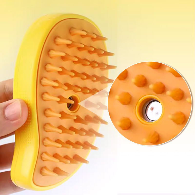 Sprøjtsikker kæledyrskam til katte med dampfunktion, ergonomisk design, gul, til pelspleje.
