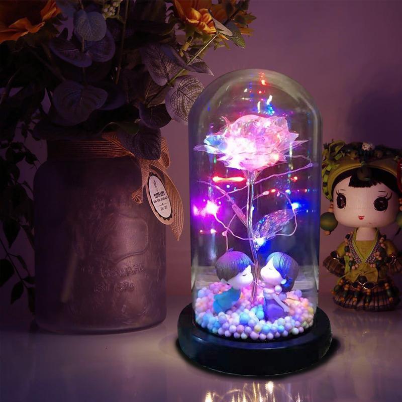 Romantisk LED Rose under glaskuppel, skaber varm og stemningsfuld belysning, ideel til hjemmet og som gave.