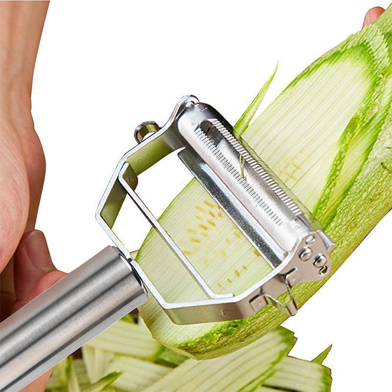 Grøntsagsskræller i rustfrit stål, sølvfarvet, ergonomisk håndtag med hængekrog, kompakt og moderne design.
