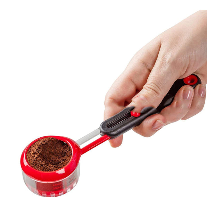 Justerbar sort og rød måleske til kaffeelskere, hjælper med præcis måling af pulveriserede ingredienser.