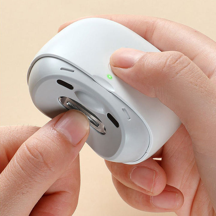 Elektrisk automatisk negleklipper med ultralyd, hvid, rustfrit stål, skønhedsprodukt.