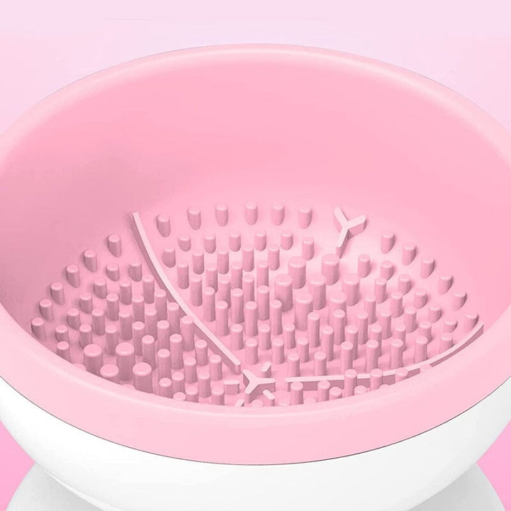 Elektrisk Make-up Børste Rengøringsmaskine, moderne og kompakt design, lilla farve, til badeværelse eller rejser.