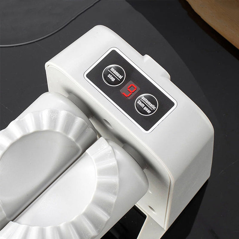 Elektrisk dumplingsmaskine, hvid, innovativ og kompakt design, laver dumplings automatisk og nemt.