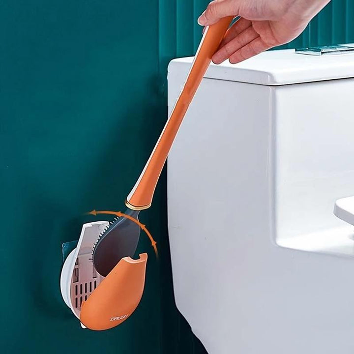 Silikonebørste til toilet med vægbeslag, blå, moderne design, pladsbesparende og hygiejnisk i brug.