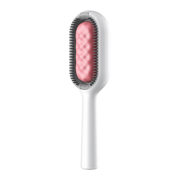 Blå/lyserød kæledyrshårfjerner med ergonomisk design og vandtank til massage og rengøring.