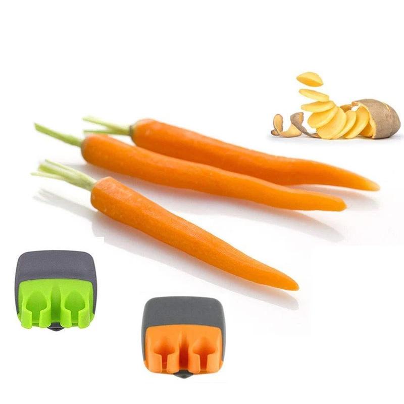 Innovativ skrællekniv med fingerdesign, orange og grøn, ergonomisk og holdbar, nem til skrælning af frugt og grøntsager, 6.5 cm.