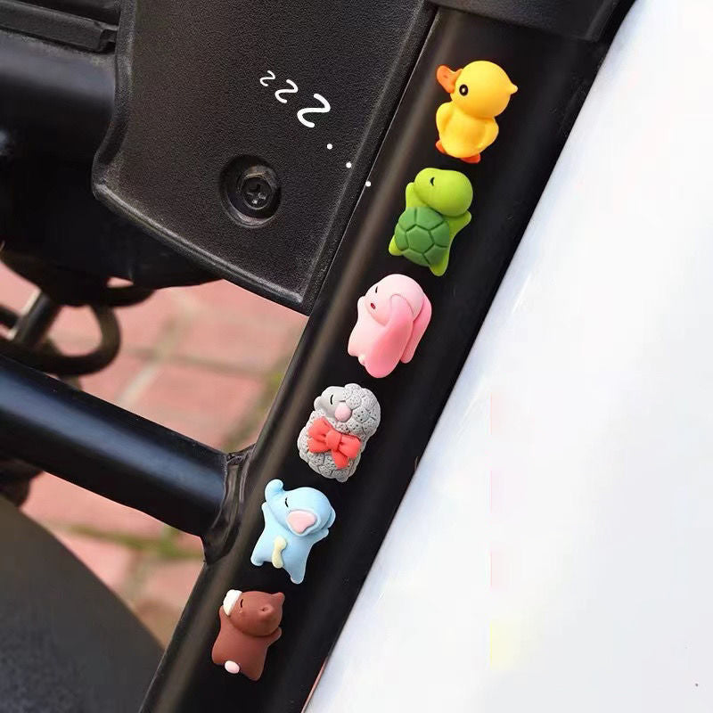 Søde hartspynt til bilen: Håndlavede dyrefigurer som skildpadde og and pifter instrumentbrættet eller hjemmet op.