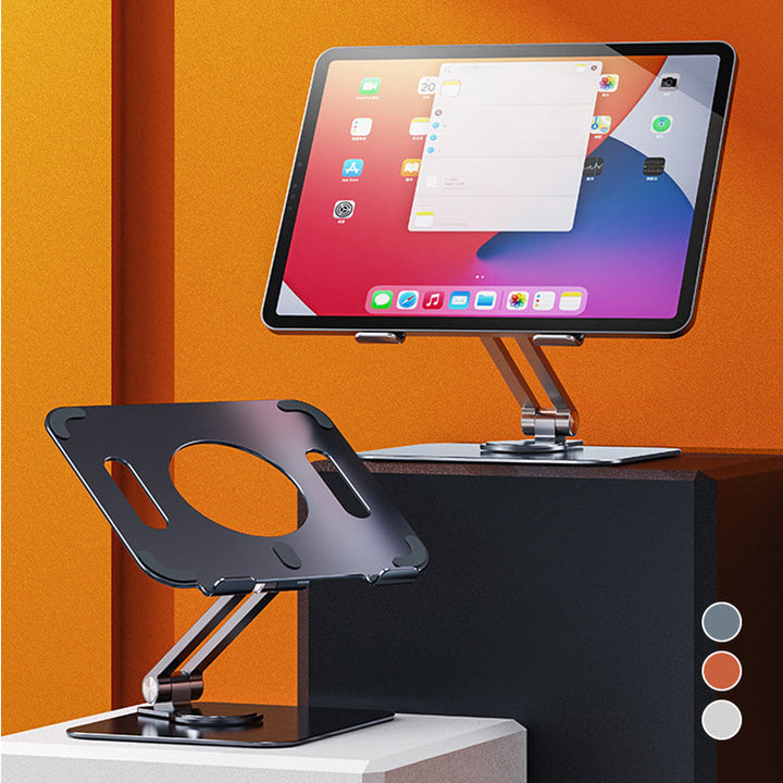 Sammenklappelig og drejelig iPad-holder i aluminium, grå, præsenteret på et bord, 360° justerbarhed, ergonomisk design og holdbar.