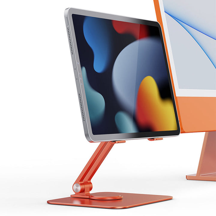 Sammenklappelig og drejelig iPad-holder i aluminium, grå, præsenteret på et bord, 360° justerbarhed, ergonomisk design og holdbar.