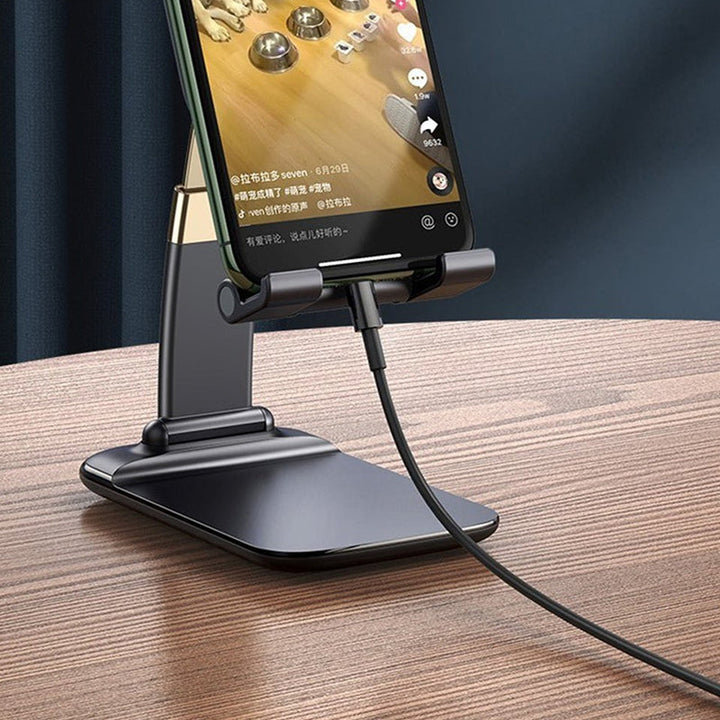 Justerbar og foldbar bordholder til smartphone, sort aluminium, minimalistisk design, velegnet til hjemmet og rejser.