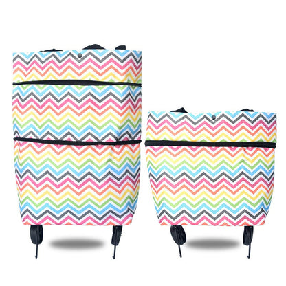 "Taitettava ostoskassi, jossa piilotetut pyörät, oranssi väri, suuri kapasiteetti 20 kg, metallituella, monikäyttöinen."