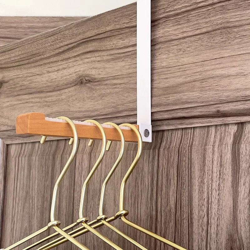 Sammenfoldelige træ dørophæng, sort-hvid, elegant finish, til ophængning og opbevaring.