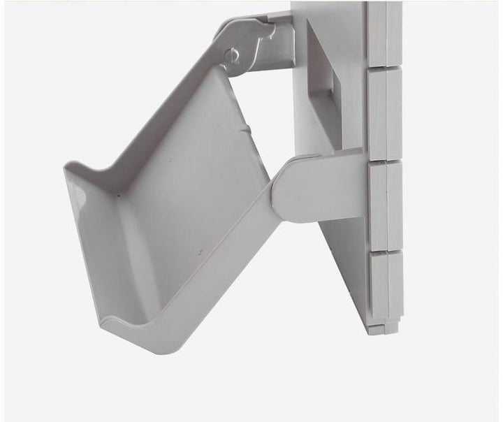 Foldbar vægmonteret skostativ, hvid plast, organiserer sko effektivt og sparer gulvplads.