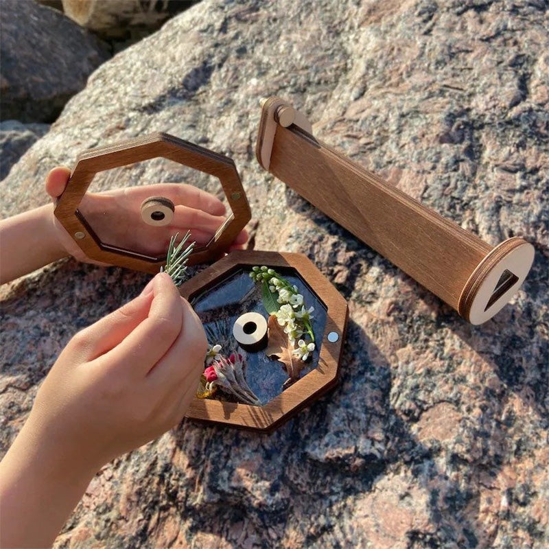 DIY træ kalejdoskop, farverigt pædagogisk børnelegetøj, viser oprettelse af fantastiske mosaikker