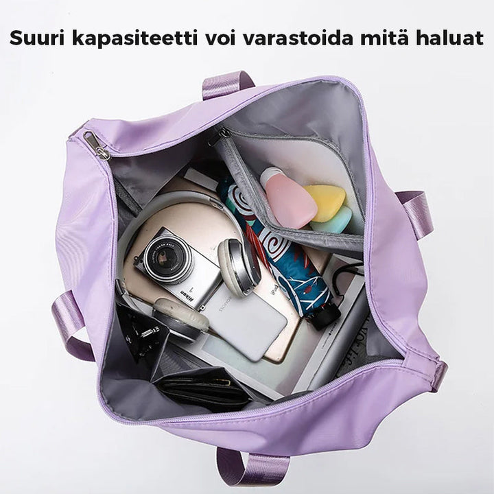 Rummelig 2-lags vandtæt rejsetaske, sort og blå, med separate rum til våde og tørre genstande.