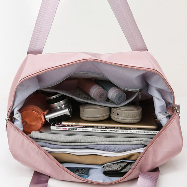 Rum unisex skuldertaske, foldbar og alsidig, lavet af holdbart Oxford-stof, blå, med flere lommer, skulderrem og håndtag