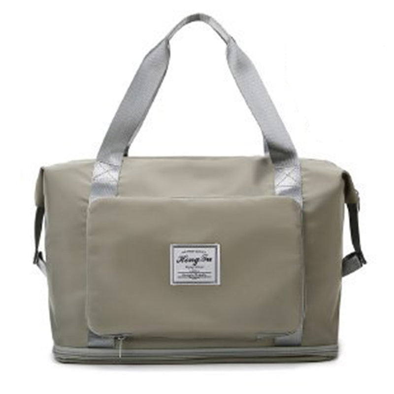 Rum unisex skuldertaske, foldbar og alsidig, lavet af holdbart Oxford-stof, blå, med flere lommer, skulderrem og håndtag