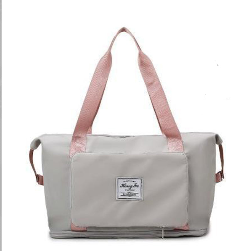 Rum unisex skuldertaske, foldbar og alsidig, lavet af holdbart Oxford-stof, blå, med flere lommer, skulderrem og håndtag