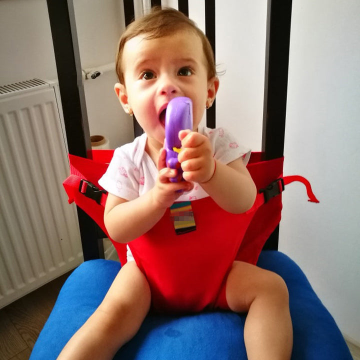Babysikkerhedssele i grøn, rød, blå, sort, gul, passer til de fleste stole og er praktisk til hjemmet og på farten.