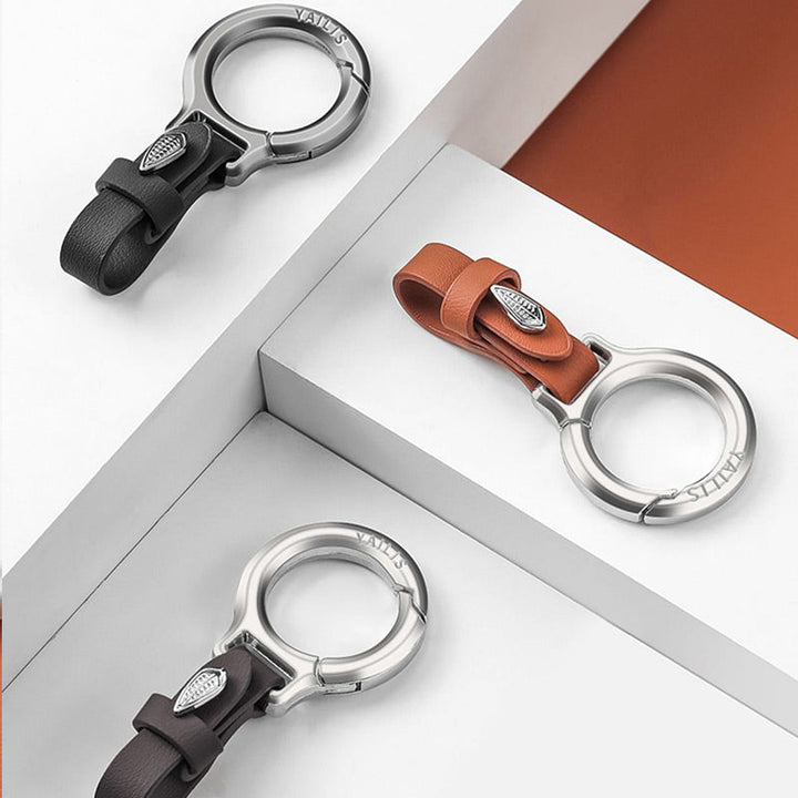 Stilfuld PU-læder nøglering, slankt design, med metalklemme, moderne og holdbart valg til bilnøgler.