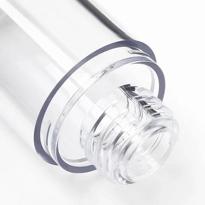 Elegant og holdbar airless pumpeflaske, transparent design, holder kosmetik hygiejnisk til rejser eller hjemme.