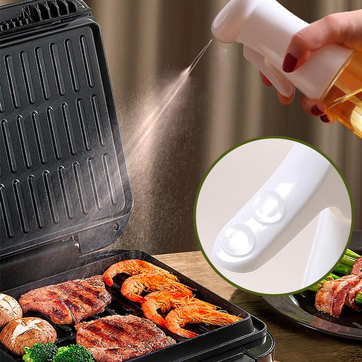 Stilfuld gennemsigtig spray olie flaske til køkkenet, ventilatorformet sprøjte, PET-plastik, 200 ml kapacitet, sort-hvid.