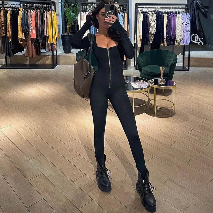 Elegant sort dame bodycon jumpsuit med firkantet halsudskæring.