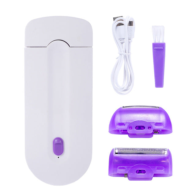 Stilfuld kvinders bærbare mikrovibrations-epilator med gylden krop og hvide detaljer.