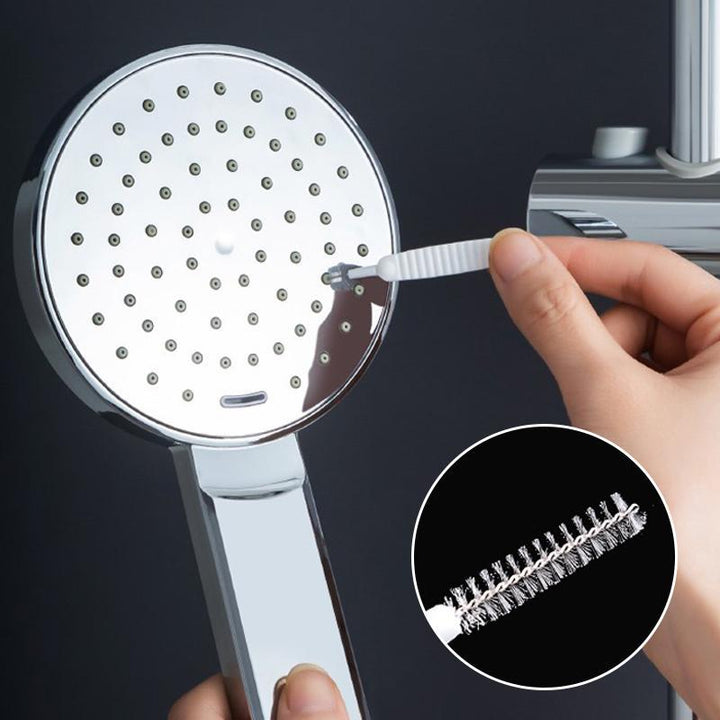 "Tyylikäs suihkupään puhdistusharja, nailonharjakset, ergonominen muotoilu, ruostumaton teräs, helppoon puhdistukseen."