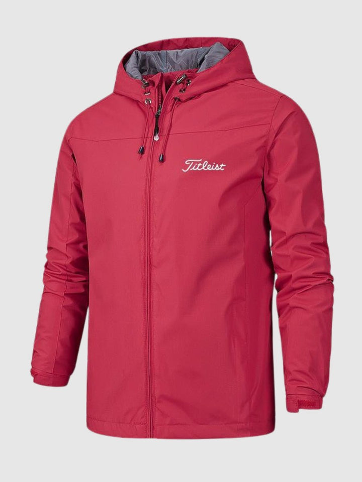 Stilfuld unisex-regnjakke forfra, åndbar og vandtæt, tidløst design, lang lige pasform, moderne regnbeskyttelse.