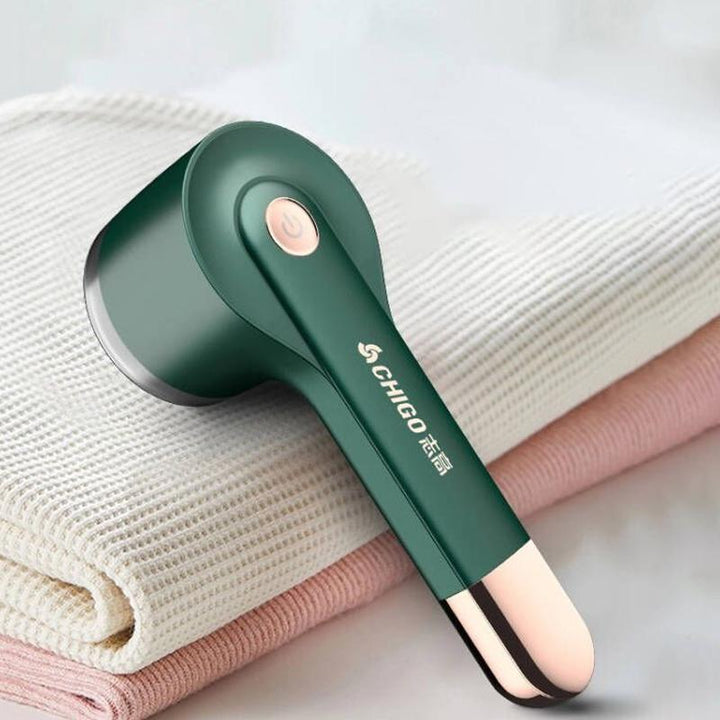 Genopladelig Stofpillefjer med USB i grøn, stilfuldt design, ABS-materiale, effektivt seksblads-system.