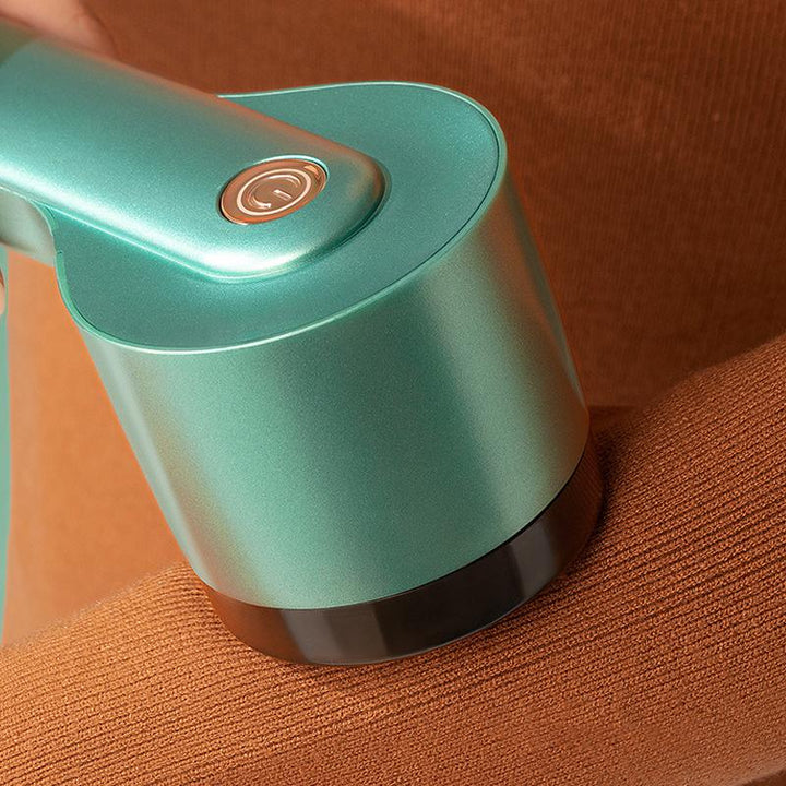 Genopladelig Stofpillefjer med USB i grøn, stilfuldt design, ABS-materiale, effektivt seksblads-system.