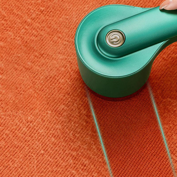 Genopladelig Stofpillefjer med USB i grøn, stilfuldt design, ABS-materiale, effektivt seksblads-system.