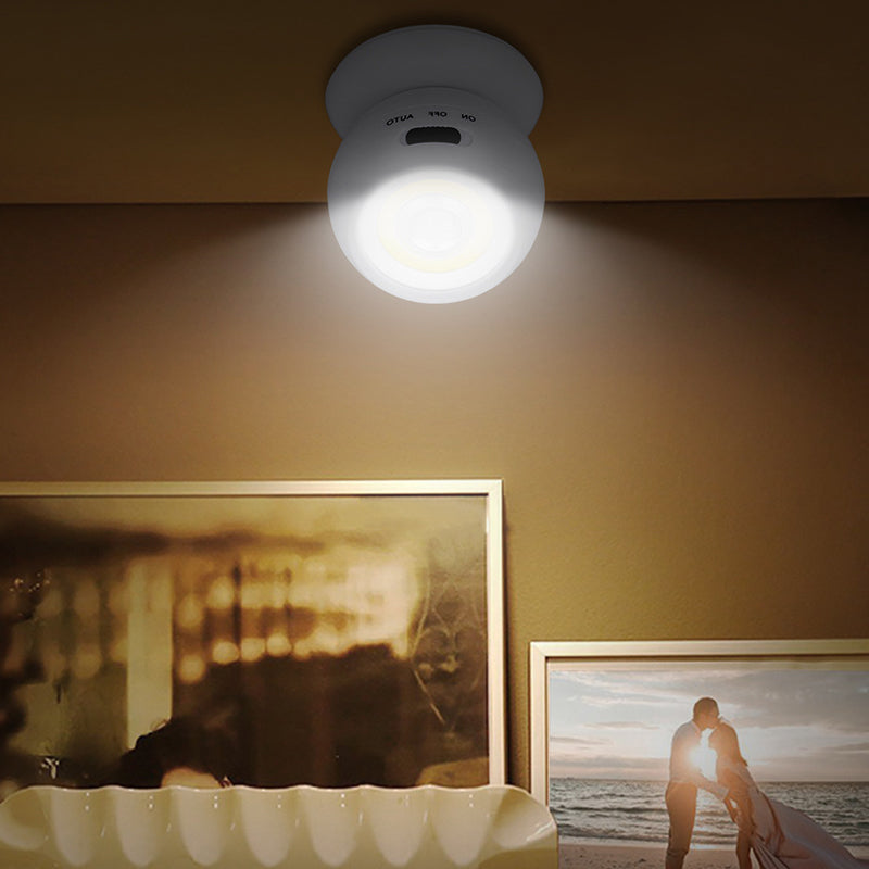 Genopladelig LED-sensorlampe til hjemmet, justerbart 360° hoved, hvidt design, praktisk vægmontering.