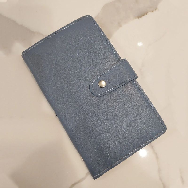 Unisex 96 kirjekuori säästöhaastekirja rahansäästöön, värikäs visuaali minttuvihreä, lila, vaaleanpunainen kirja.