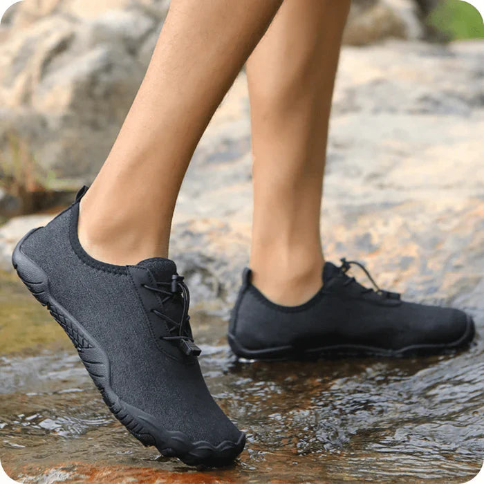 "Unisex barefoot kengät, kevyt ja hengittävä kangas, ergonominen pohja, tyylikäs luonnollinen muotoilu edestä katsottuna."