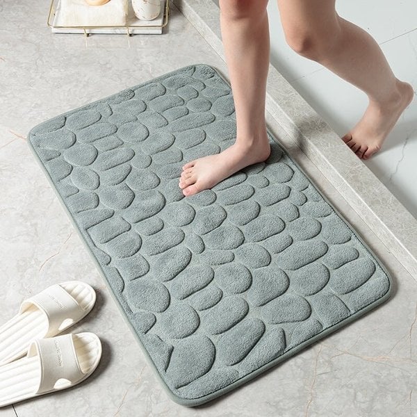 Unisex korallifrotee kylpyhuonematto, pehmeä ja pörröinen, liukastumisenestolla; kivimäinen kuvio ja nopea imukyky.