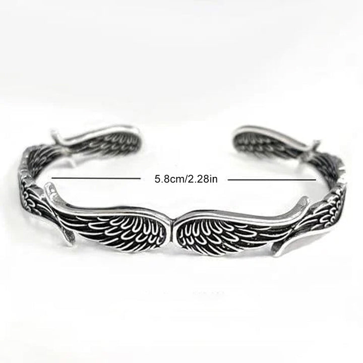 Unisex armbånd med englevinger i vintage-stil, smukt detaljeret design, giver beskyttelse og harmoni.