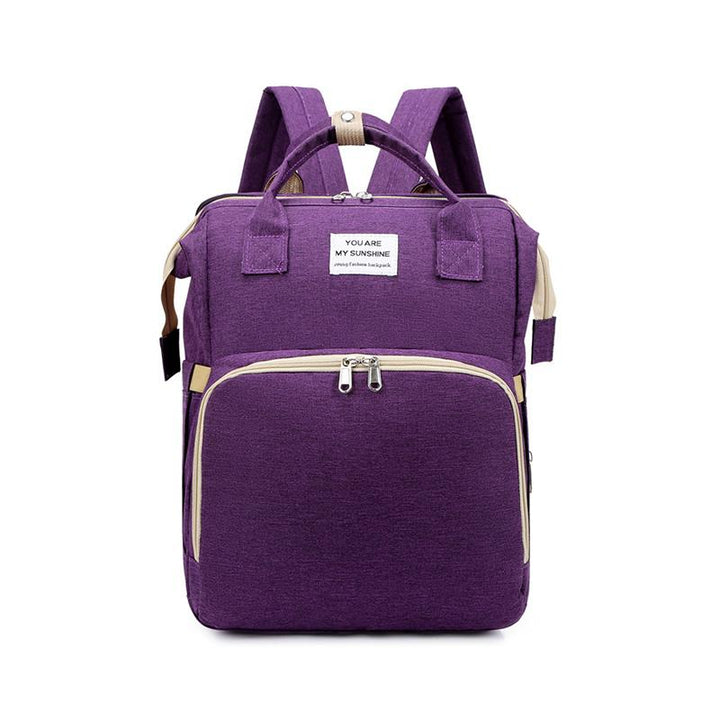 Unisex babyplejerep med seng, mange lommer til babyudstyr, foldet sammen, gråt Oxford-stof.