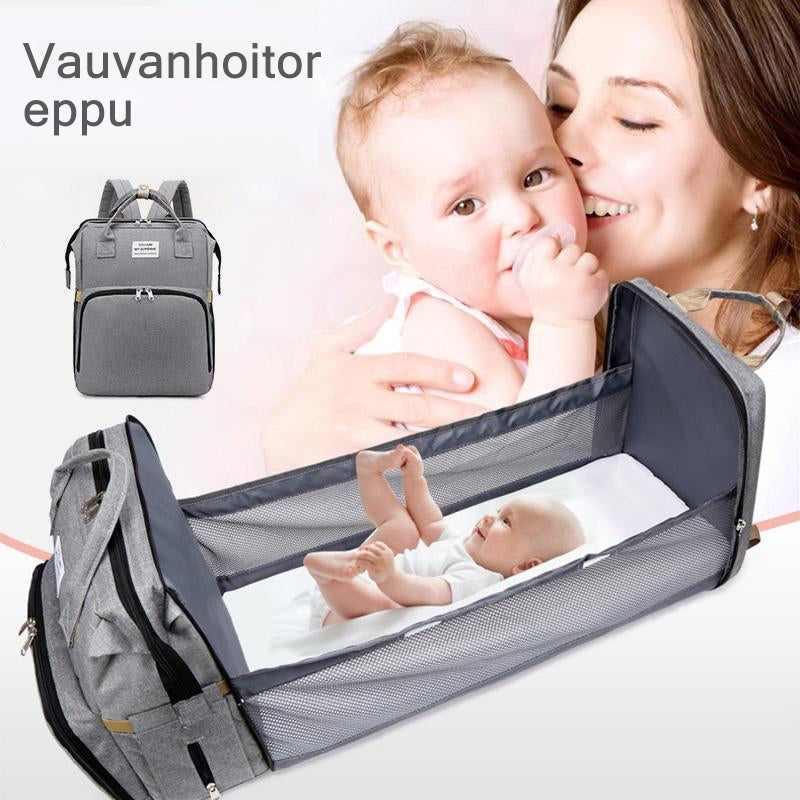 Unisex babyplejerep med seng, mange lommer til babyudstyr, foldet sammen, gråt Oxford-stof.
