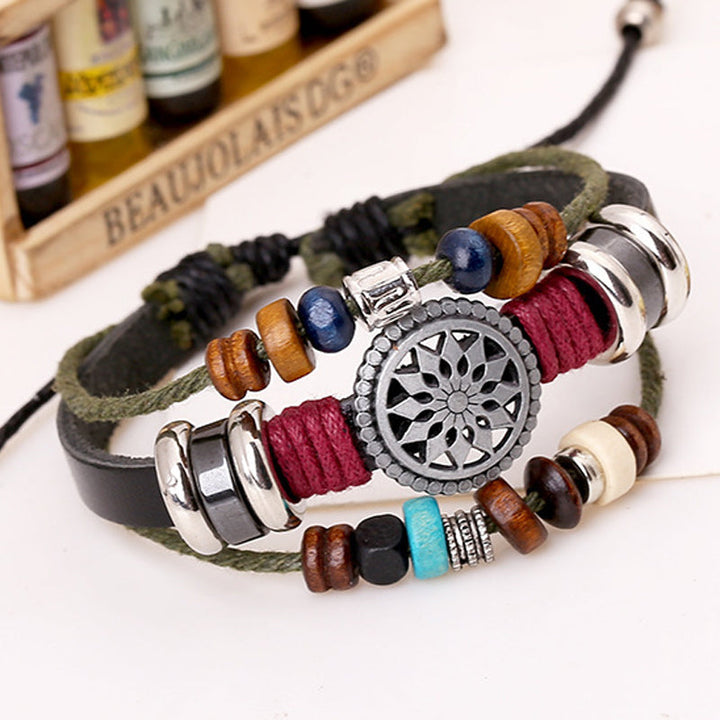 Unisex vintage læderarmbånd, justerbart, sort læder, antikke sølvdetaljer, retrostil, unisex tilbehør.