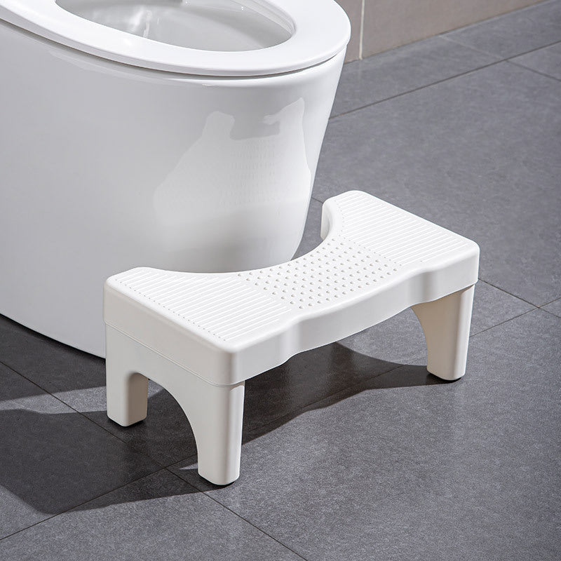Universel toiletsskammel, minimalistisk grå, gul, blå og hvidt design, kompakt størrelse til badeværelset.