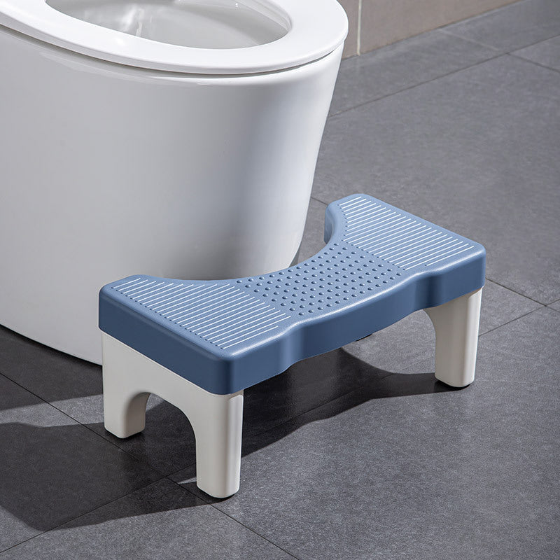 Universel toiletsskammel, minimalistisk grå, gul, blå og hvidt design, kompakt størrelse til badeværelset.