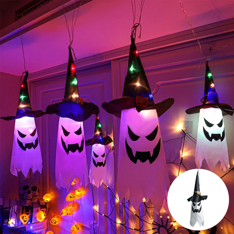 "Valaistu Halloween noitahattu ulkokäyttöön, ripustettuna pimeässä, luo mysteerisen tunnelman puutarhaan tai terassille."