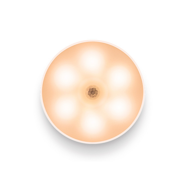 Hvid LED smart sensorlampe, elegant design, varmt lys, USB-opladelig, alsidig montering.