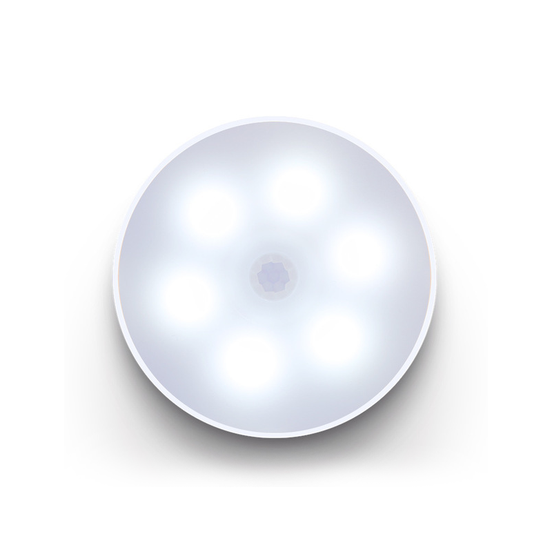 Hvid LED smart sensorlampe, elegant design, varmt lys, USB-opladelig, alsidig montering.