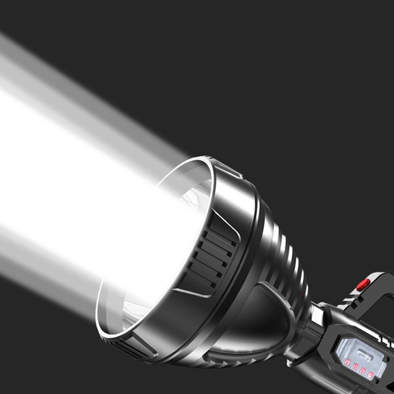 Vandtæt USB genopladelig LED lommelygte, sort ABS-skal, kraftig lyskegle, ergonomisk design.