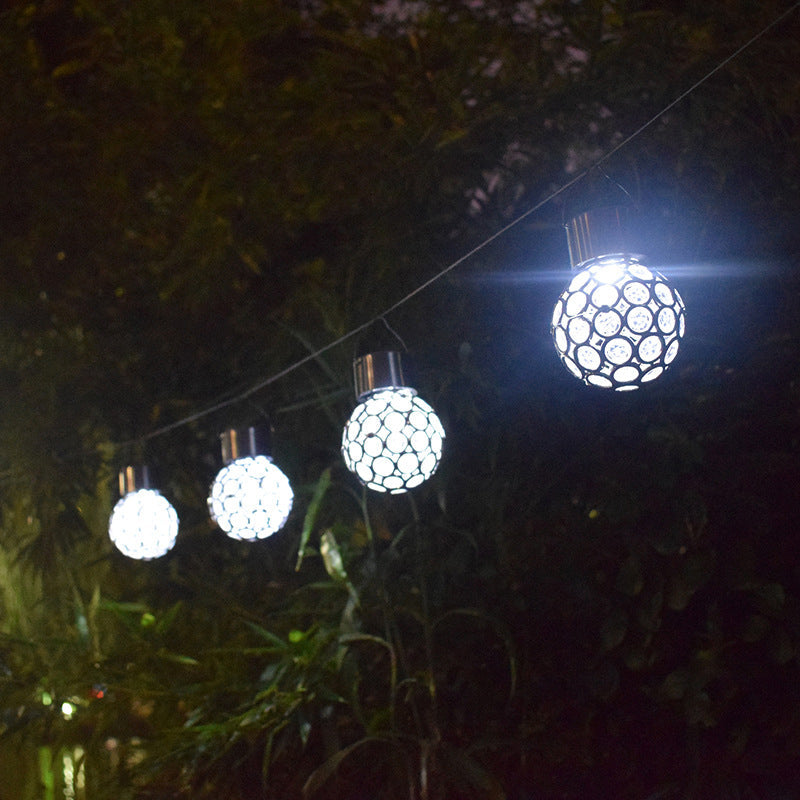 Vandafvisende, solcelledrevet udendørslampe; elegant design, hult lys, flerfarvet LED-lys til haven.