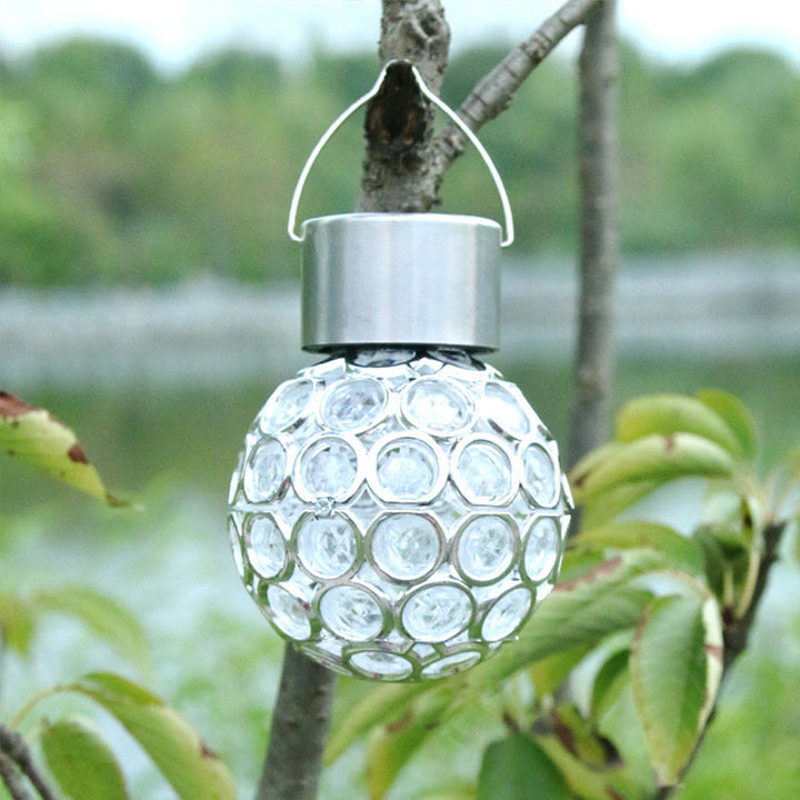 Vandafvisende, solcelledrevet udendørslampe; elegant design, hult lys, flerfarvet LED-lys til haven.