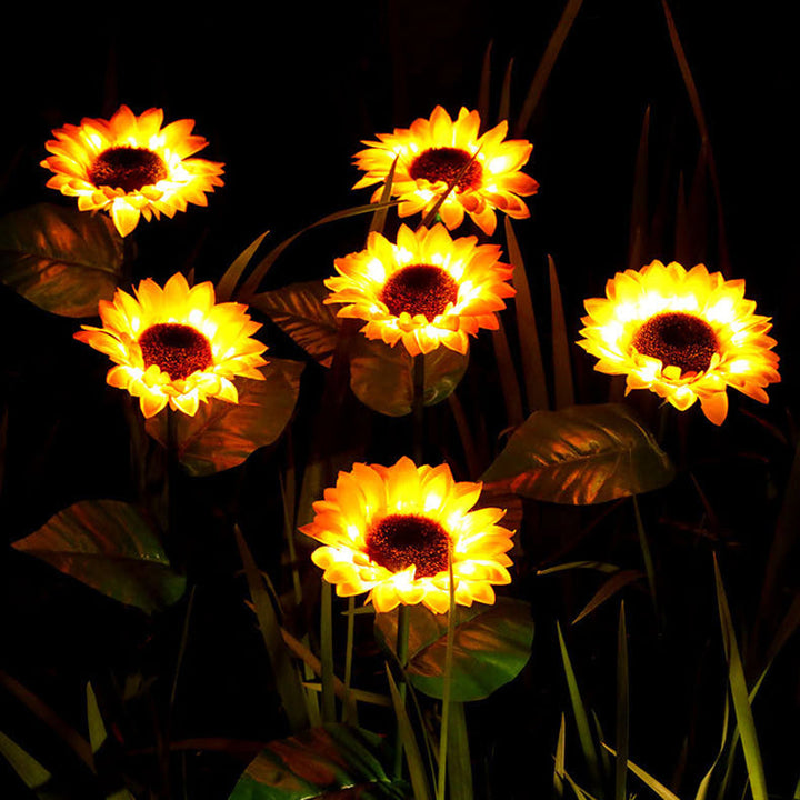 Vandtæt solblomst lampe til udendørs brug, gult lys, soldrevet, IP65 vejrbestandighed.